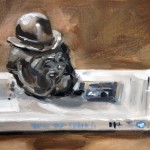 Painting of a bulldog paper weight on a book